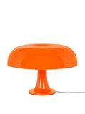 Artemide Nessino Orange. Lampe de table avec abat-jour. Luminaire en polycarbonate à émission de lumière diffuse. Fabriqué en Italie [Classe énergétique A]
