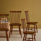 sweeek - Lot de 4 chaises Noyer à barreaux en Bois d'hévéa. Romie. L 50.8 x P 44.2 x H 90cm.