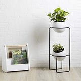 UMBRA Nesta freestand. Porte Plante Nesta. En céramique et métal. Coloris noir et blanc moucheté gris. Dimension 21.8x21.8x70cm