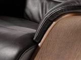 Angel Cerdá Fauteuil pivotant relax tapissé en cuir de vachette, pieds en acier massif poli gris anthracite, structure en bois noyer, style moderne