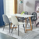 IDIMEX Lot de 4 chaises Alvaro pour Salle à Manger ou Cuisine avec 4 Pieds en métal Noir et Assise capitonnée, revêtement synthétique Blanc
