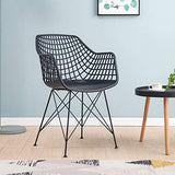 IDIMEX Lot de 4 chaises Alicante pour Salle à Manger ou Cuisine au Design Retro avec accoudoirs, Coque en Plastique Noir et 4 Pieds croisé en métal laqué Noir