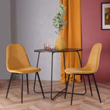 Ensemble de 4 chaises de salle à manger de cuisine, faciles à assembler, chaises latérales à coussin en velours avec de solides pattes en métal noir pour le salon de la cuisine familiale, jaune
